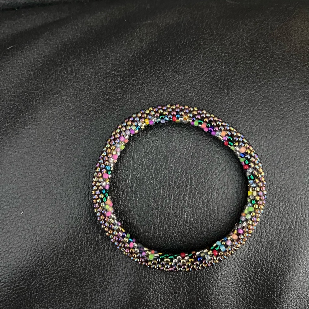 Black and Green Beaded Bracelet with Tubular Design
